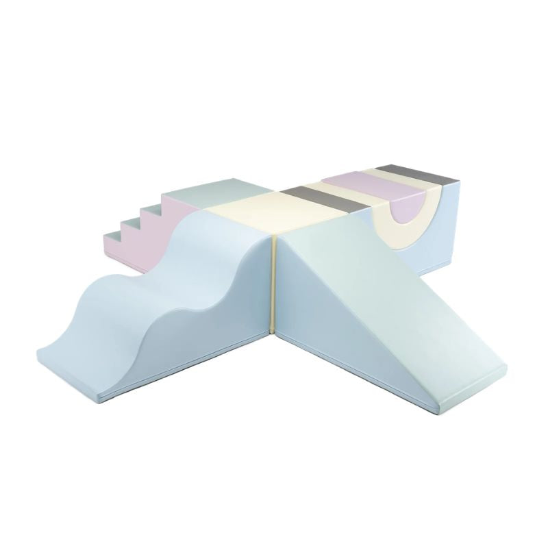 IGLU Adventure Gym soft play gym assembled in the Light Pastel colourway with steps, wave slide, cube and rainbow arch