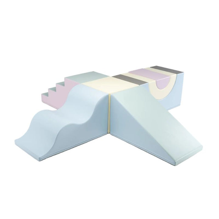 IGLU Adventure Gym soft play gym assembled in the Light Pastel colourway with steps, wave slide, cube and rainbow arch