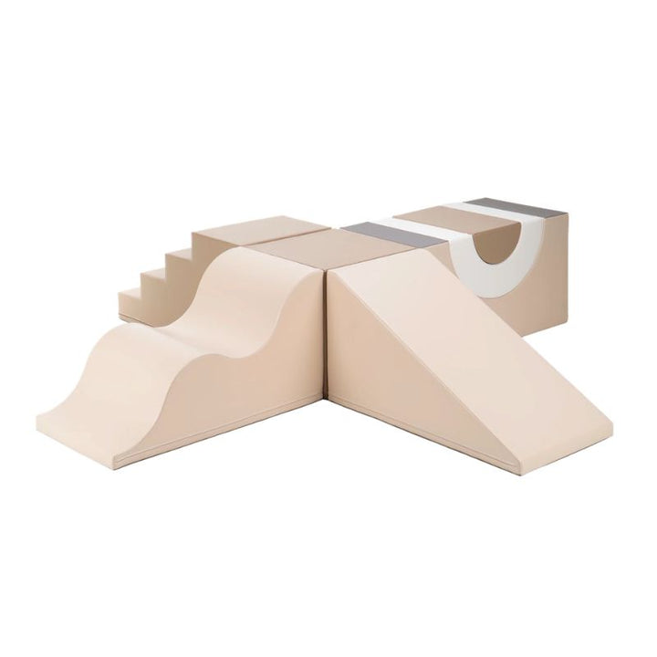 IGLU Adventure Gym soft play gym assembled in the Soft Serve colourway with steps, wave slide, cube and rainbow arch