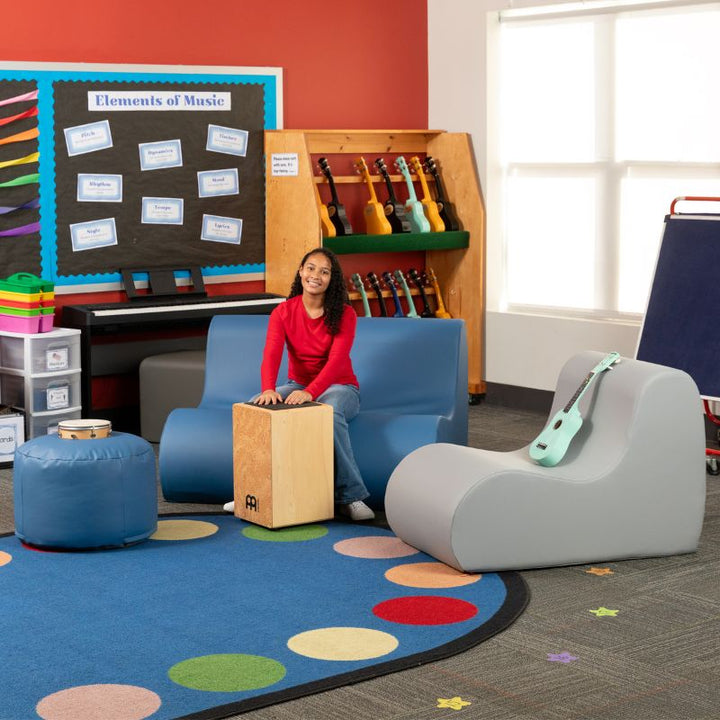 Grey and blue Jaxx Midtown soft seating couches in a school music room collaborative space