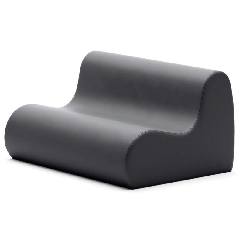 Jaxx Midtown soft seating couch for classrooms in black vinyl, a durable calm corner loveseat