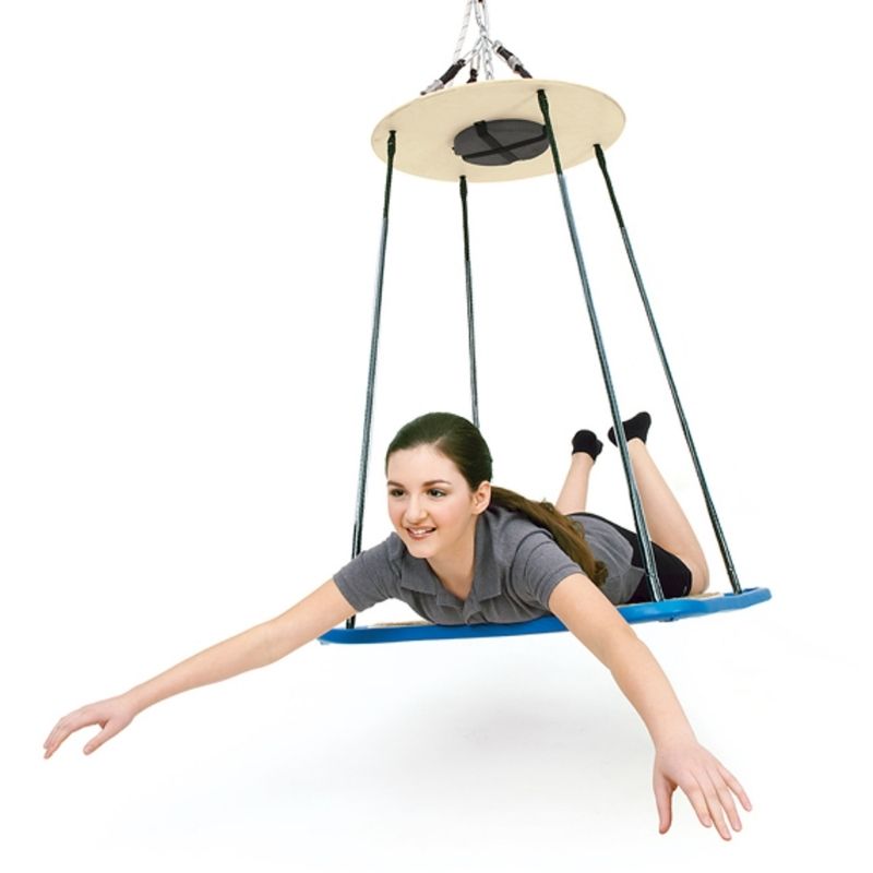 Southpaw Modified Platform Swing in use with an adult woman, a vestibular therapy swing with enlarged disc for teens and adults