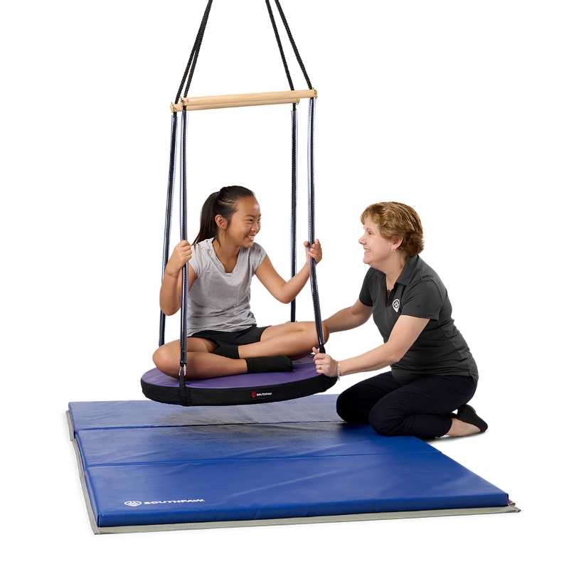 Child and adult engaging together with the Southpaw Soft-Lite Round Platform Swing, a portable vestibular therapy swing for sensory integration in clinic and home settings