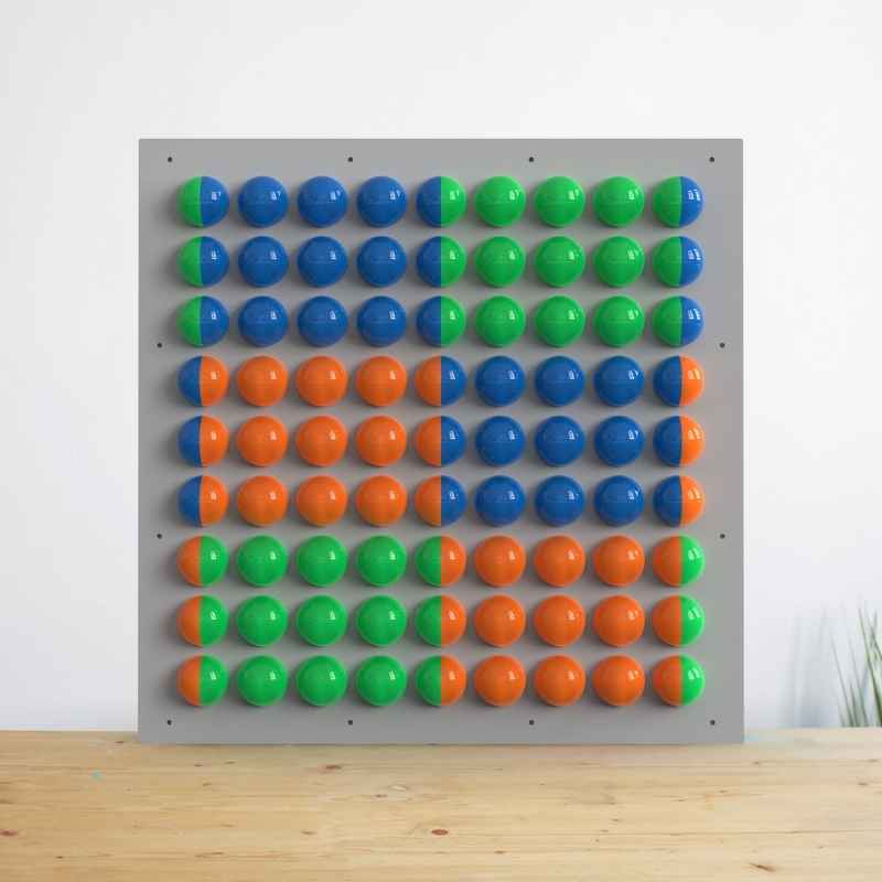 LiteZilla Spinfinity Wall interactive spinning wall panel with blue, green and orange split colour spheres on a grey panel