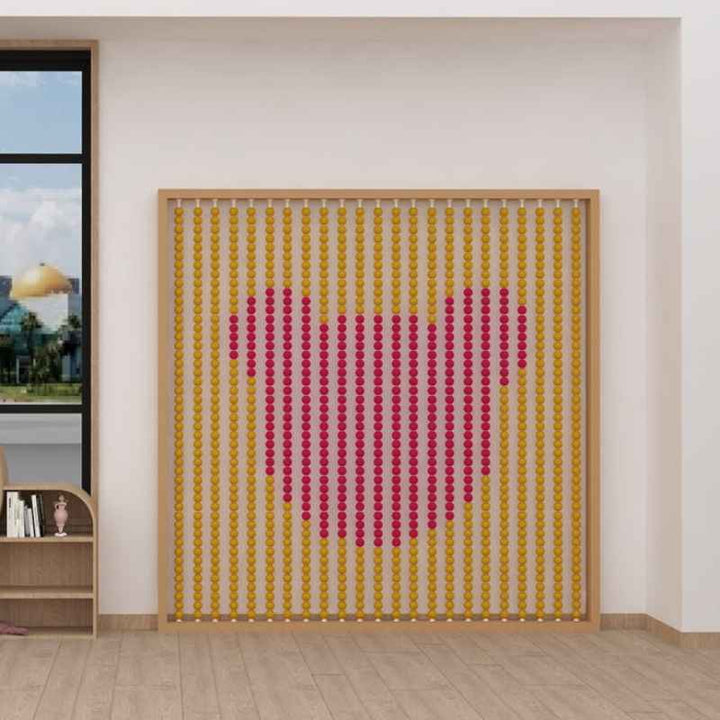 LiteZilla product shown as a hanging bead curtain forming a heart pattern in a wooden frame