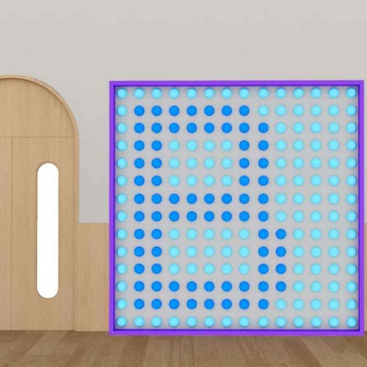 LiteZilla Spinfinity Wall interactive spinning wall panel rendered in blue tones with a purple frame in a modern interior setting 