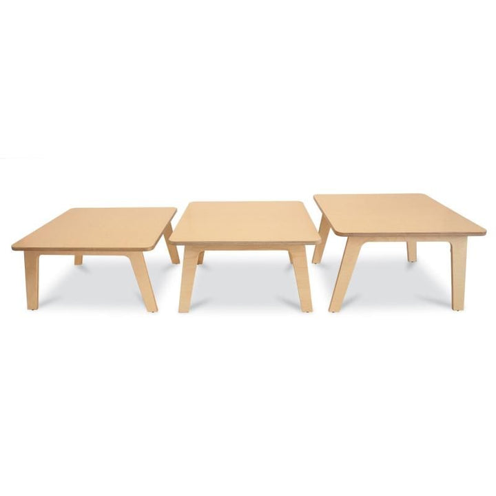 Whitney Brothers Whitney Plus Square Activity Table shown side by side in 18, 20 and 22 inch heights, a birch plywood kids table for every age group
