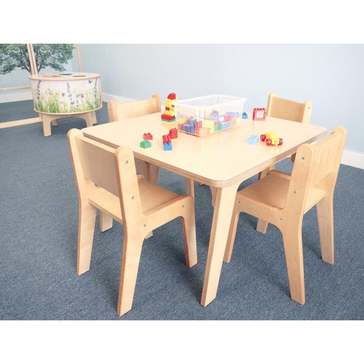 Whitney Brothers Whitney Plus Square Activity Table 22H with four birch chairs and building blocks, a classroom table for fine motor play