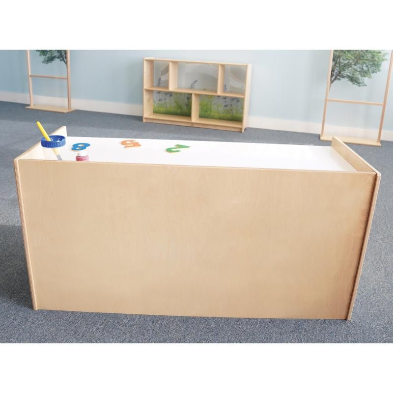 Back view of the Whitney Brothers STEM Activity Desk with Trays in a classroom, showing the finished birch plywood panel of this two-student preschool STEM desk
