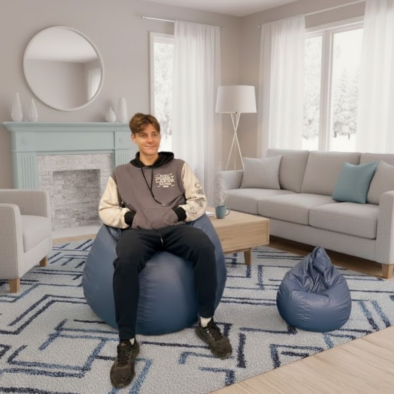 TFH Bean Bag Seat in blue, large size, with adult user in a therapy room setting demonstrating sensory seating comfort and support
