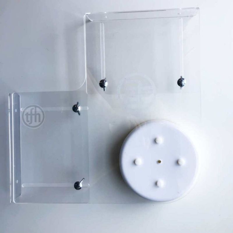Close-up detail of the TFH telescopic bubble tube wall bracket for 6" Standard tubes, showing the adjustable arm and secure mounting construction