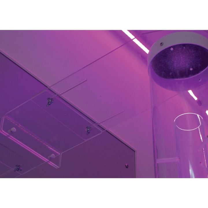 TFH 6" Bubble Tube Bracket installed on a wall in a sensory room, securing a TFH Standard bubble tube against tipping and movement