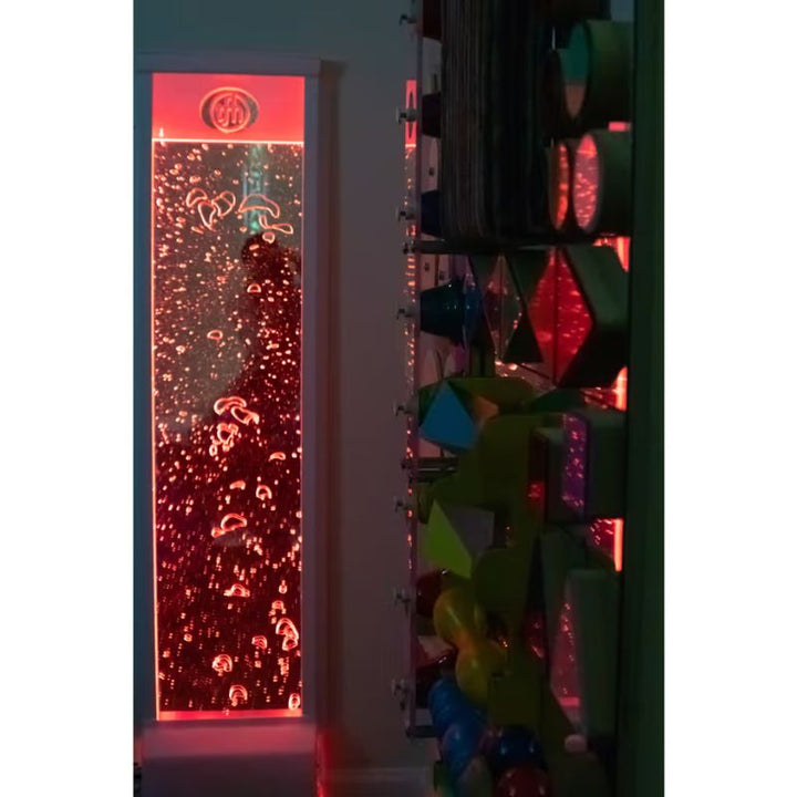 TFH Bubble Wall glowing red on a sensory room wall, a wall mounted bubble wall for calming visual play