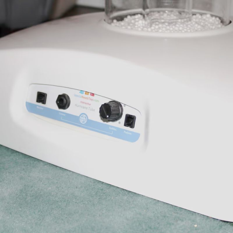 Control panel and adjustable fan speed dial on the base of a TFH hurricane tube waterless bubble tube