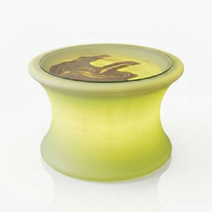 TFH Illuminated Sensory Messy Mood Table glowing yellow-green with sand beneath its glass top, a light-up sensory table for calming tactile and messy play