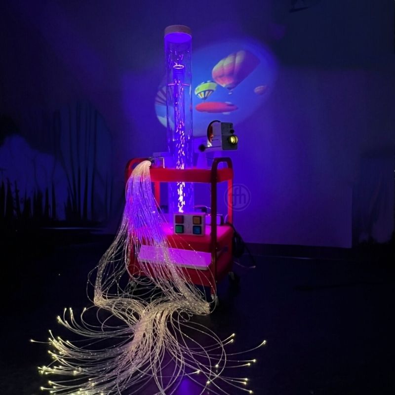 TFH Little Red Sensory Cart Deluxe Hurricane Waterless full view showing the waterless hurricane snow bead tube, Solar 80 LED projector, and 100 fibre optic tails on the infection-control safe portable sensory station
