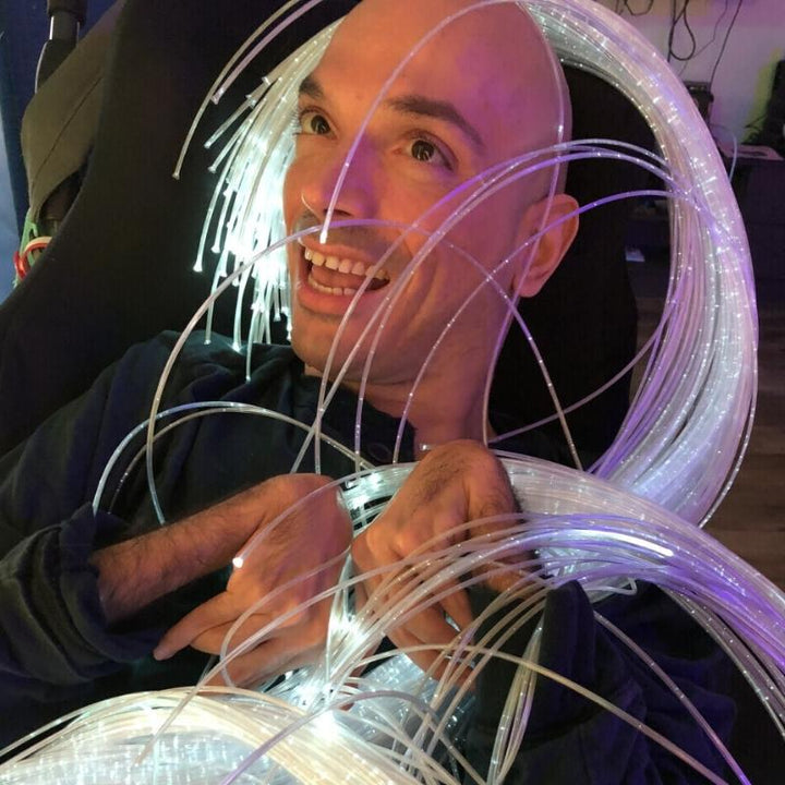TFH Sensory Room Magic Genie System Starter close-up of a happy child during active sensory play in the interactive multi-sensory room, demonstrating engagement and enjoyment