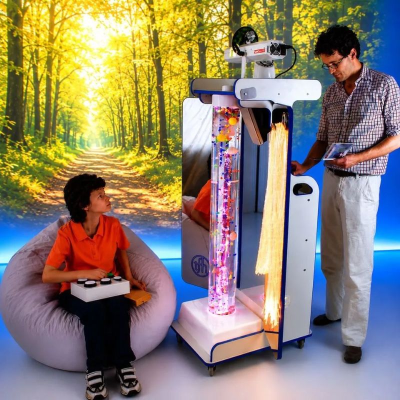 Two adults using the 4-Button Colour Controller on the TFH Mobile Sensory Cart Deluxe during a portable multi-sensory session