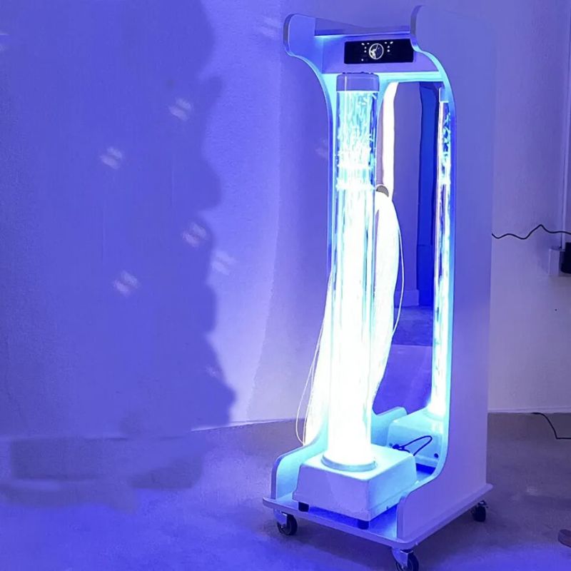 TFH Vecta Jr Mobile Sensory Cart Waterless glowing blue, showing the 40" Hurricane Tube, acrylic mirror, fibre optic tails and locking casters of this portable sensory station