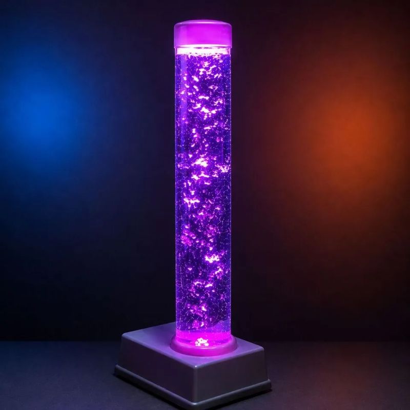 TFH Tabletop Bubble Tube Kit glowing purple on a dark background, showing the portable 24" sensory bubble tube with rising bubbles for calming visual stimulation