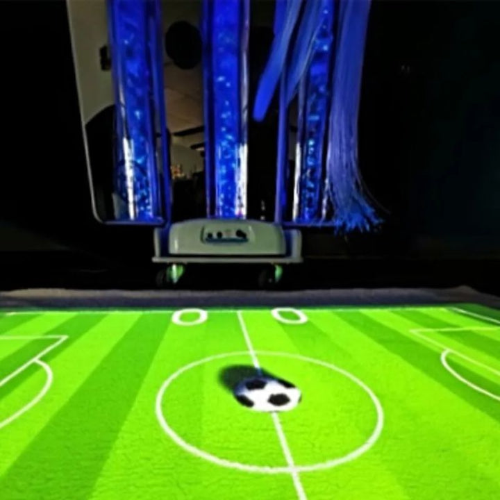 TFH Vecta Budii projecting an interactive soccer game onto the floor from the Omi Budii Ball Game Suite, turning any room into an active play space
