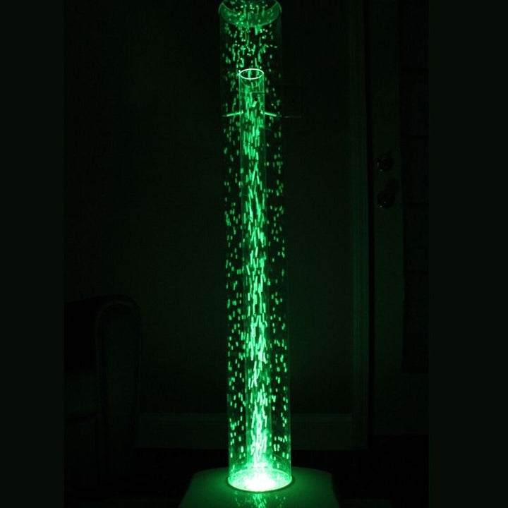 TFH Interactive Waterless Hurricane Tube 70-inch variant in a darkened sensory room, showing the full-height colour-changing waterless bubble column in a therapy or care setting