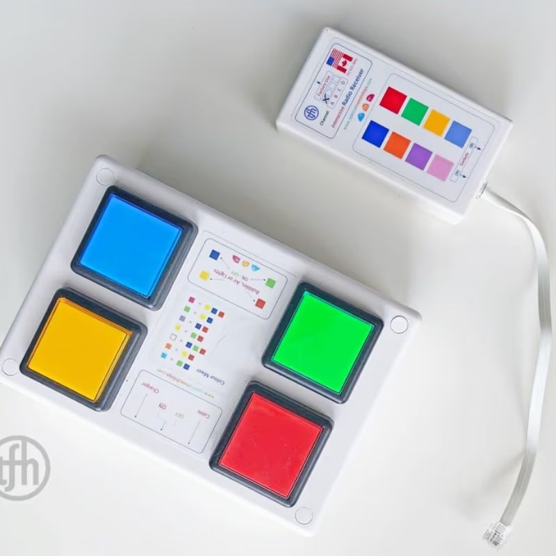 TFH 4-Button Wireless Colour Controller paired with its wireless receiver for sensory room colour control