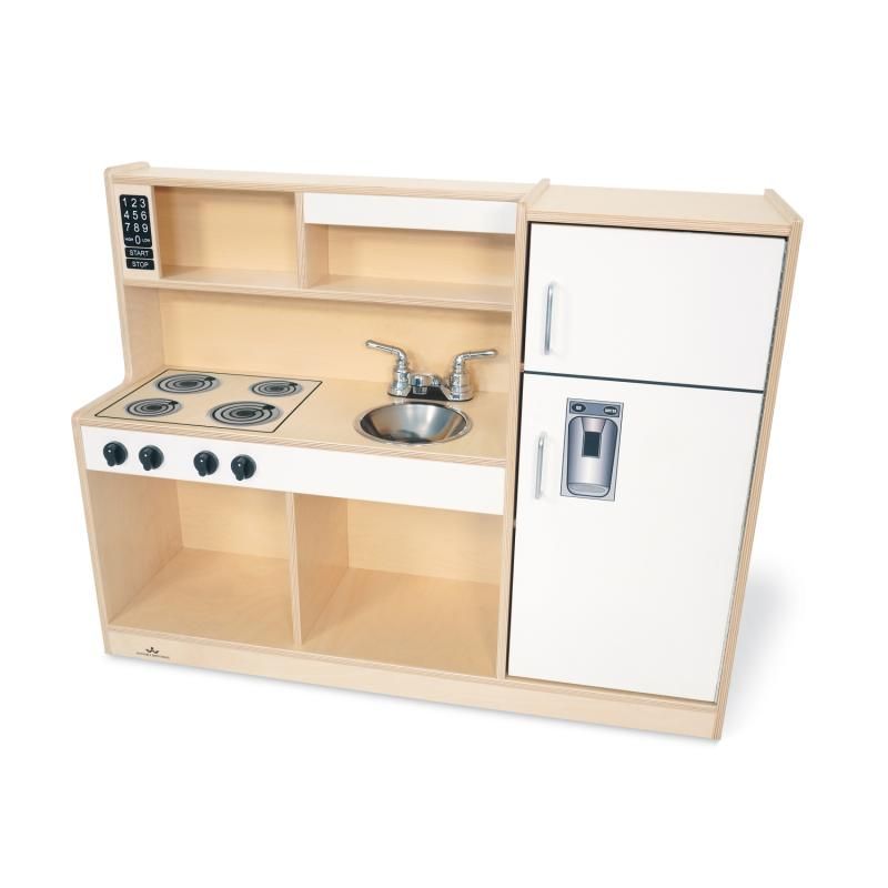 Front view of the Whitney Brothers Let's Play Toddler Kitchen Combo in white, a birch plywood toddler play kitchen with clicking stove knobs and a sink