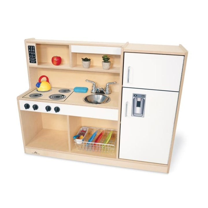 Whitney Brothers Let's Play Toddler Kitchen Combo with stove, sink, refrigerator, and hutch, a white wooden play kitchen set up for pretend play