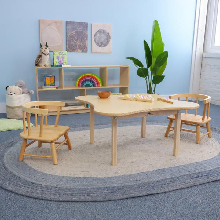 Whitney Brothers Toddler Flower Table and Chair Set styled in a calm early learning room, a wooden toddler table set up for hands-on daycare and classroom activities