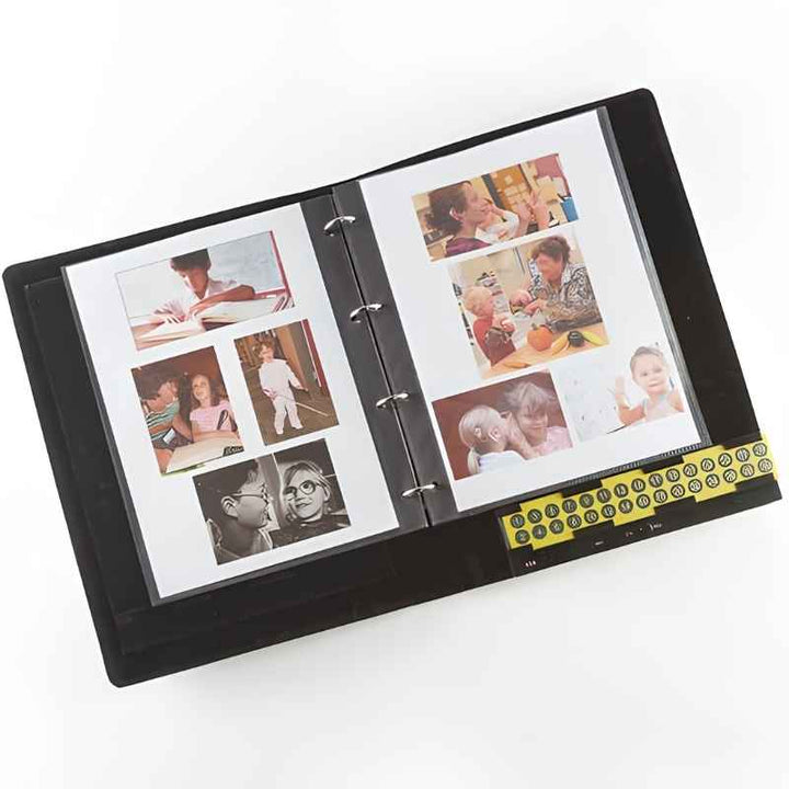 TTS A4 Talking Recordable Photo Album open to show clear plastic sleeve pages filled with photos of children and adults, with the numbered recordable button panel visible along the spine