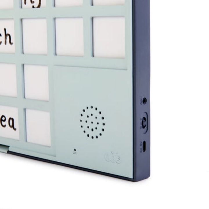 Side profile of the TTS A3 Chatter Board Pro showing the headphone socket, power switch, and USB-C charging port, supporting rechargeable classroom use