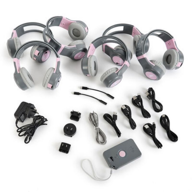 Students using TTS ClassCast wireless headphones during a group listening activity, demonstrating wireless audio broadcasting for language learning and auditory learning