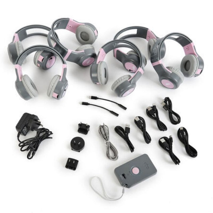 Students using TTS ClassCast wireless headphones during a group listening activity, demonstrating wireless audio broadcasting for language learning and auditory learning
