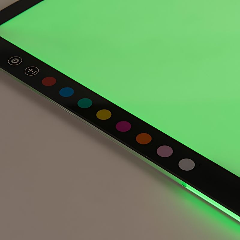 Close-up of the colour and brightness controls on the TTS Colour Changing Light Panel, with eight colour settings and three brightness levels