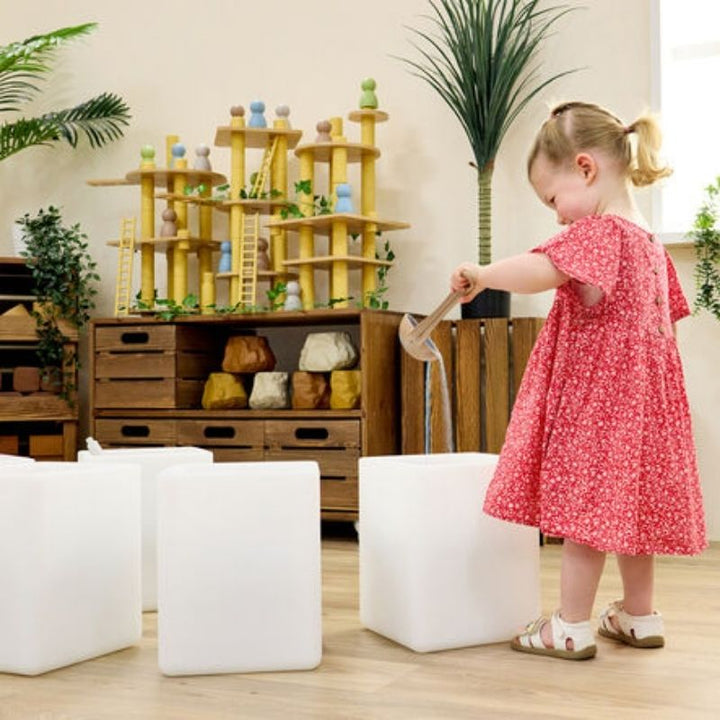 TTS Glow Cubes combined into a single collaborative sensory play surface, showing the flexible arrangement options for group activities