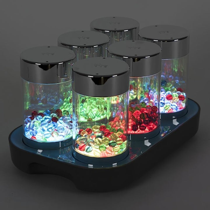 TTS Glow Roller Shakers illuminated in a landscape view, showing the vibrant LED colour glow used in sensory rooms and early years settings