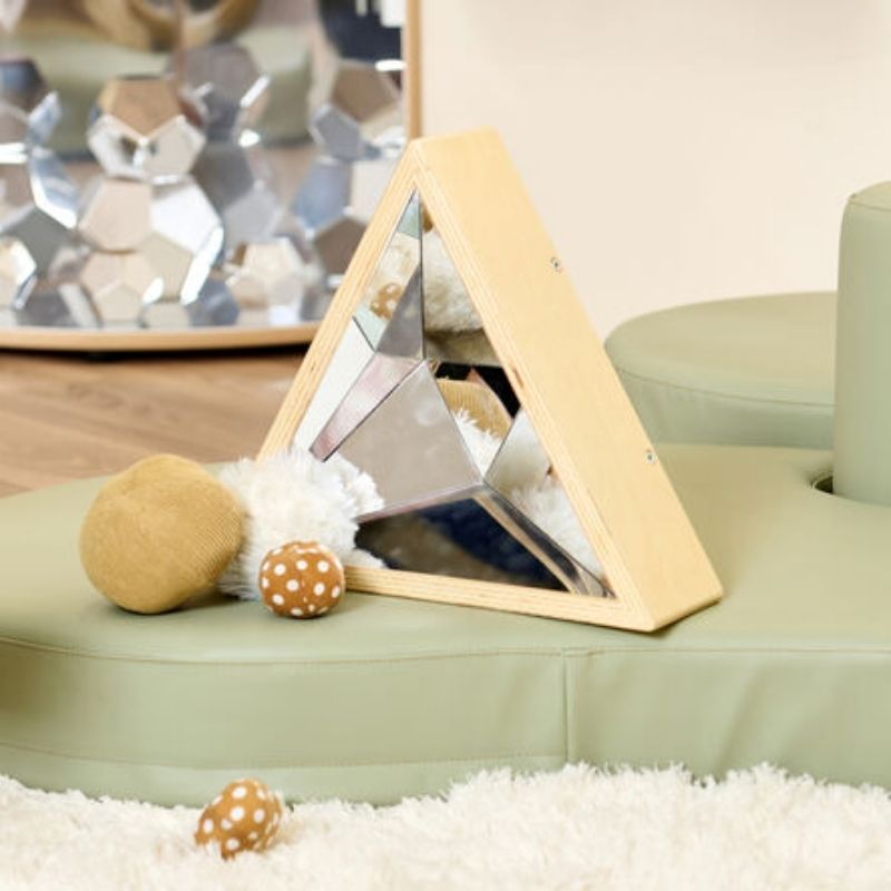 Close-up view of the TTS Kaleidoscope Mirror faceted surface design, showing the reflective texture used for early childhood visual development