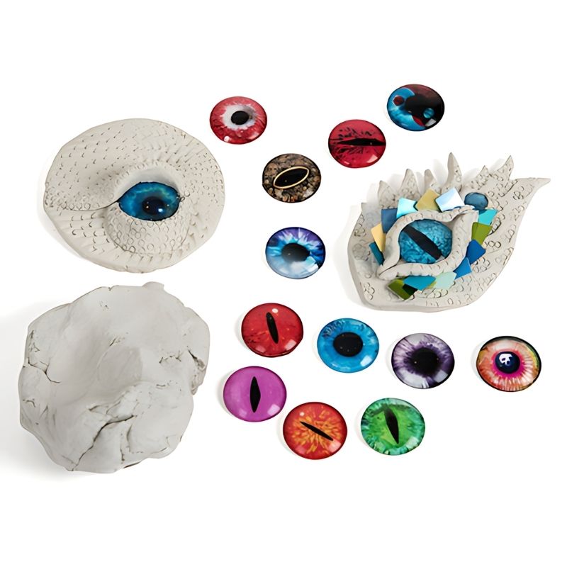 Multiple eye drawings on TTS Light Panel Messy Play Protective Cover, illustrating creative sensory mark-making supported by illuminated light panel play