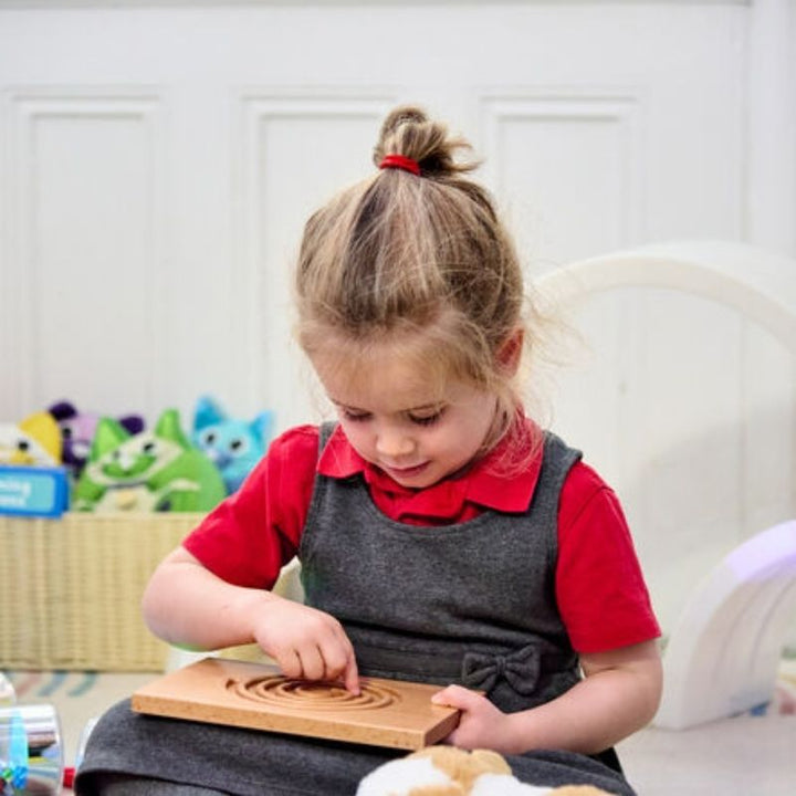 TTS Breathing and Mindfulness Boards 6pk lifestyle image showing the wooden self-regulation tools in a calm, therapeutic home or school environment