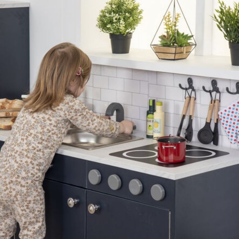 Close detail of the metal sink and turning taps on the TTS Modern Living Sink and Hob Unit, supporting realistic pretend play and hygiene conversations