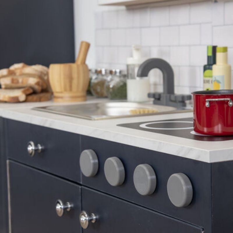 TTS Modern Living navy kitchen unit range in a full early years setting, with the Sink and Hob Unit as part of a complete modular pretend play kitchen for schools and nurseries