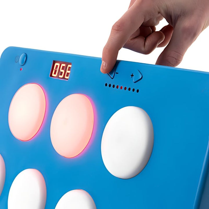 Rear view of the TTS Portable Reaction Wall Game showing the two eyelets used for wall mounting, enabling standing active play in classrooms, therapy rooms, and PE settings