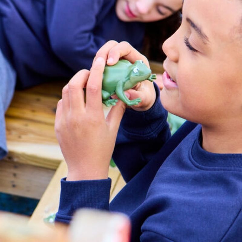 Child using TTS Recordable Talking Frogs in an early years setting, demonstrating their role in hands-on communication development