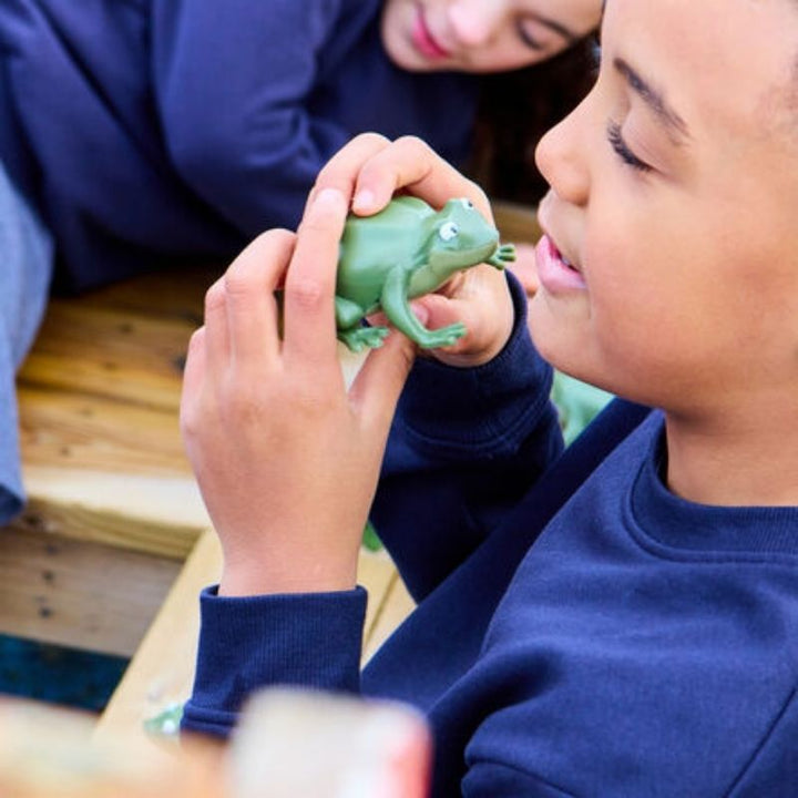 Child using TTS Recordable Talking Frogs in an early years setting, demonstrating their role in hands-on communication development