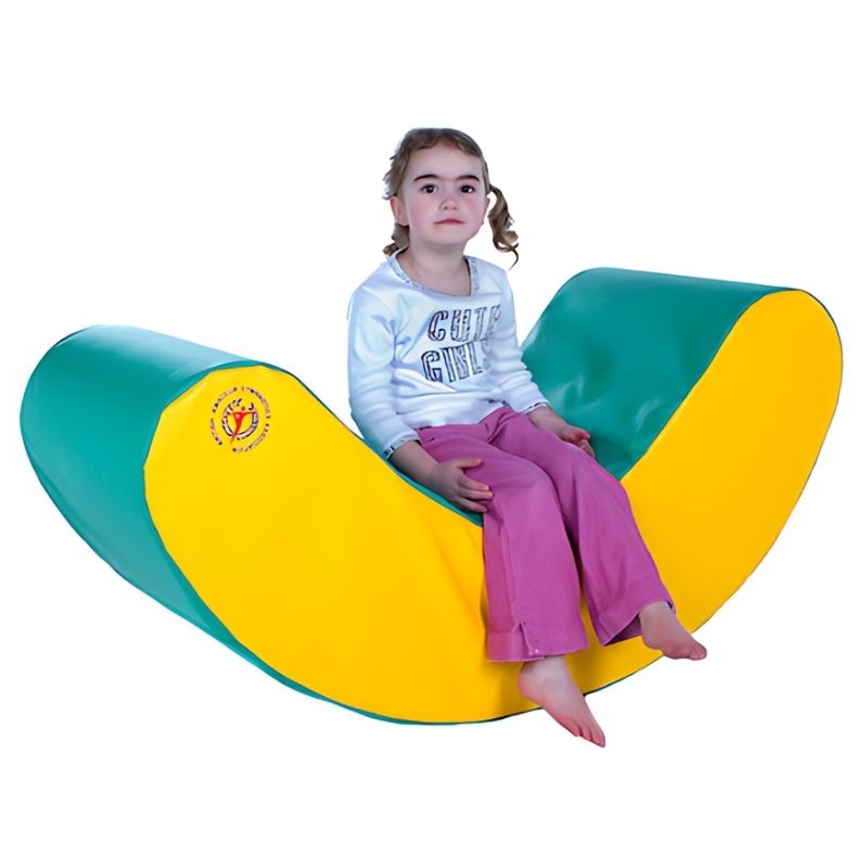 TTS Soft Banana Gym Rocker showing curved foam rocker profile, designed for balancing, rolling and active play in classrooms, gymnasiums and therapy spaces