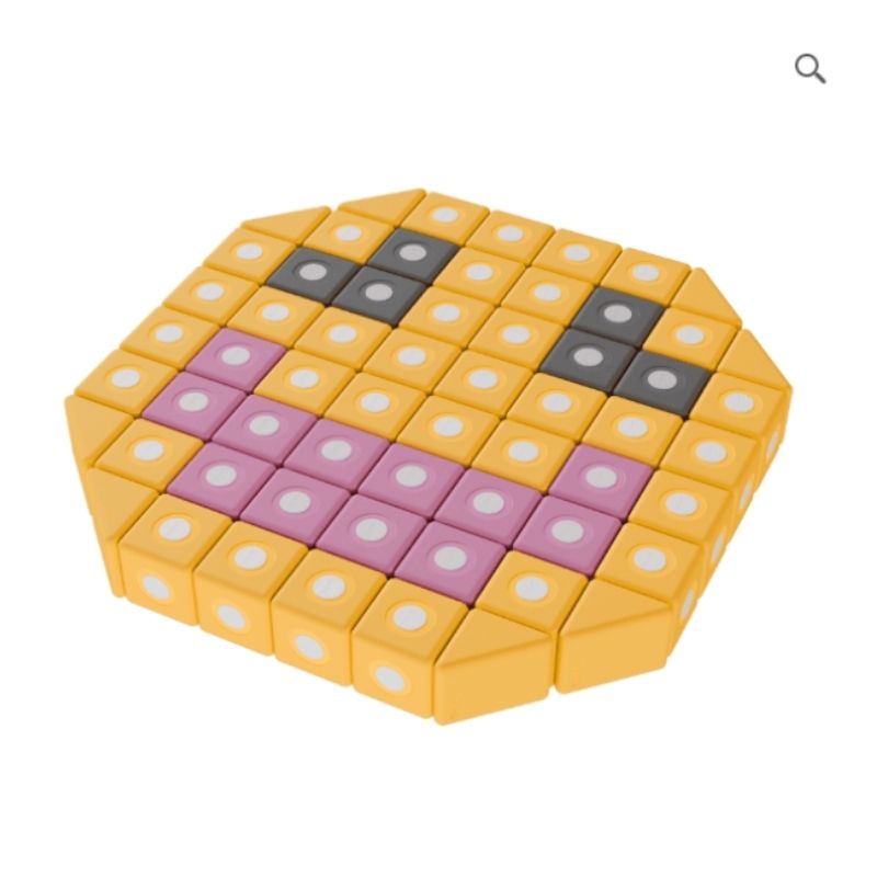 TUKI BIG Smart Magnetic Blocks Smart 50 arranged into a smiley figure, demonstrating the creative imaginative construction the 3 Smart TUKI shapes including the pyramid enables across the 50-piece 4-colour group-use SMART set