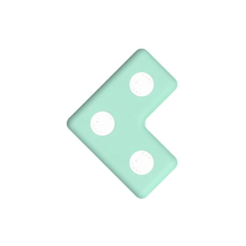 TUKI Regular Magnetic Foam Block L-shape in green, one of the 7 Regular TUKI shapes in the 48-element group construction set, showing the modular design that connects universally with all other TUKI Regular block shapes