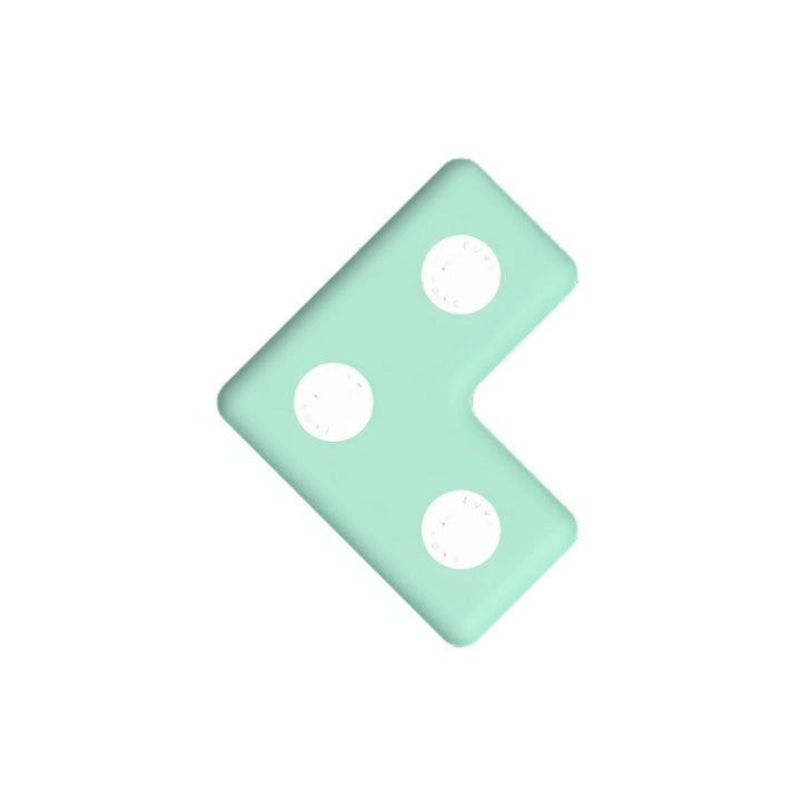 TUKI Regular Magnetic Foam Block L-shape in green, one of the 7 Regular TUKI shapes in the 48-element group construction set, showing the modular design that connects universally with all other TUKI Regular block shapes