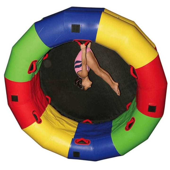 Child actively playing on the Tumbl Trak Fitness Wheel, demonstrating gross motor development, vestibular input, and proprioceptive engagement during gymnastics or adaptive sensory movement use